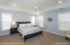 Tray ceiling and recessed lighting in the bedroom. The Peyton plan 1289.