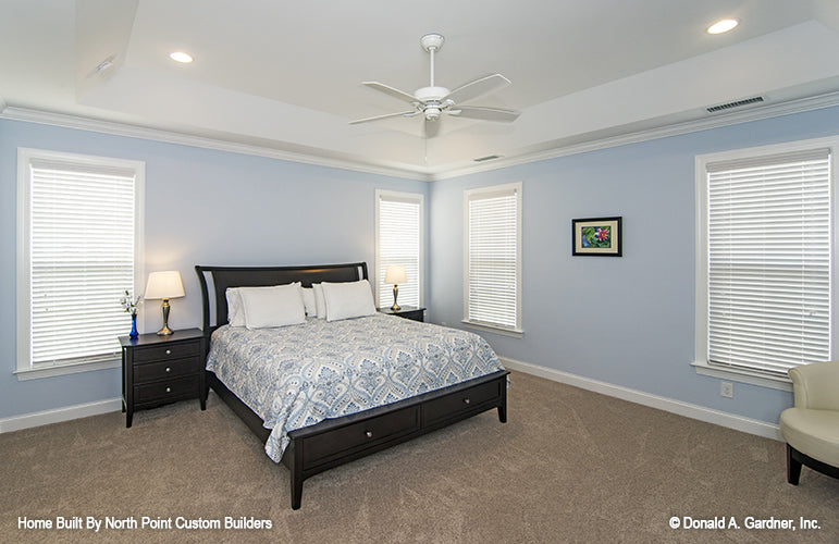 Tray ceiling and recessed lighting in the bedroom. The Peyton plan 1289.