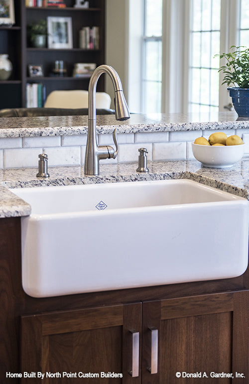 Farmhouse style sink in the kitchen. The Peyton plan 1289.