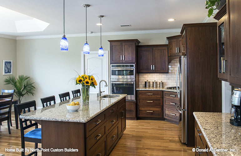 Stainless-steel appliances in the kitchen. The Peyton plan 1289.