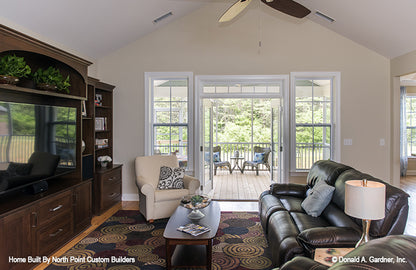 Patio doors open out towards the patio from the living room. The Peyton plan 1289.