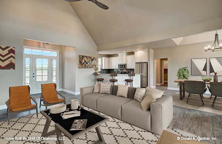 The great room is the primary gathering and entertainment space for small house plan 1316 The Primrose