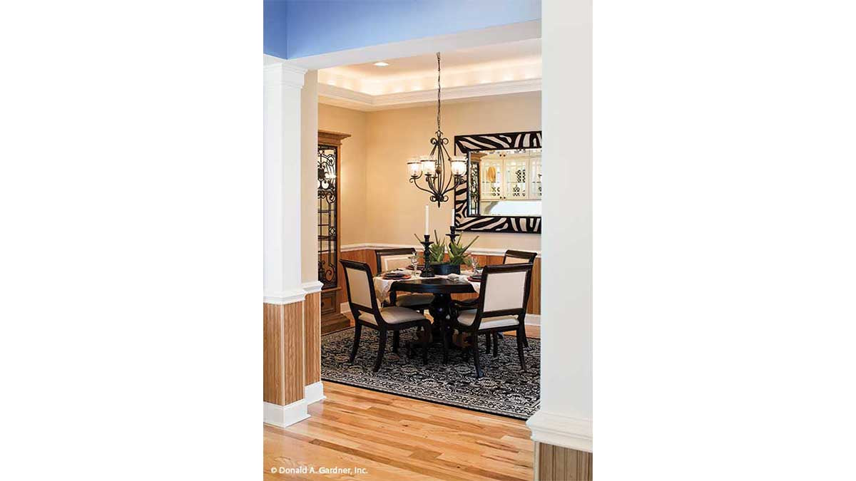 This is a photograph of the dining room of three bedroom house plan 1005 The Provence as built by a customer