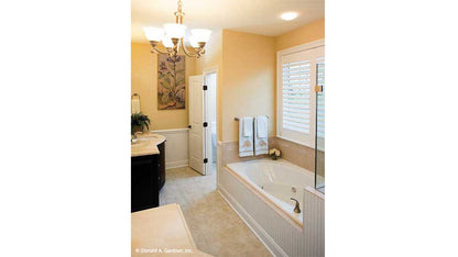 This is a photograph of the master bath of three bedroom house plan 1005 The Provence as built by a customer