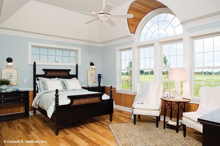 This is a photograph of the master bedroom of three bedroom house plan 1005 The Provence as built by a customer