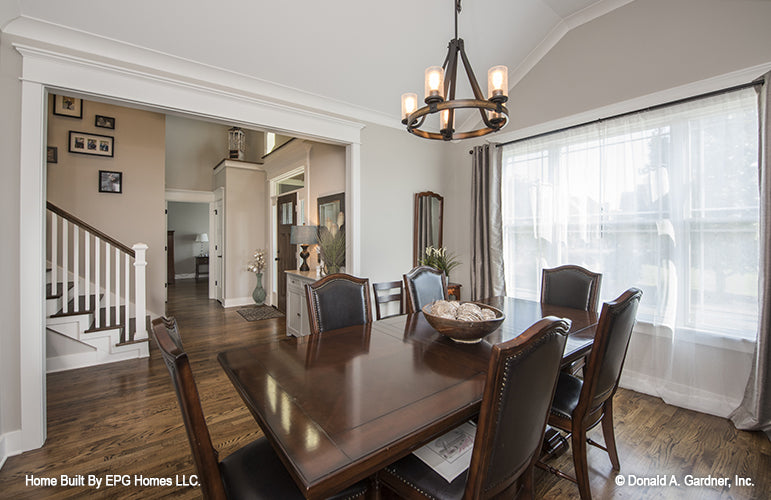 Dining room picture with foyer of simple house plan 1108 The Radford