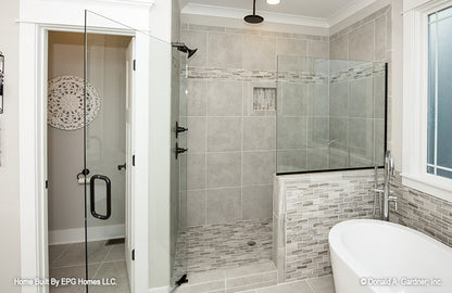 Picture of the master bathroom with shower and tub of simple house plan 1108 The Radford