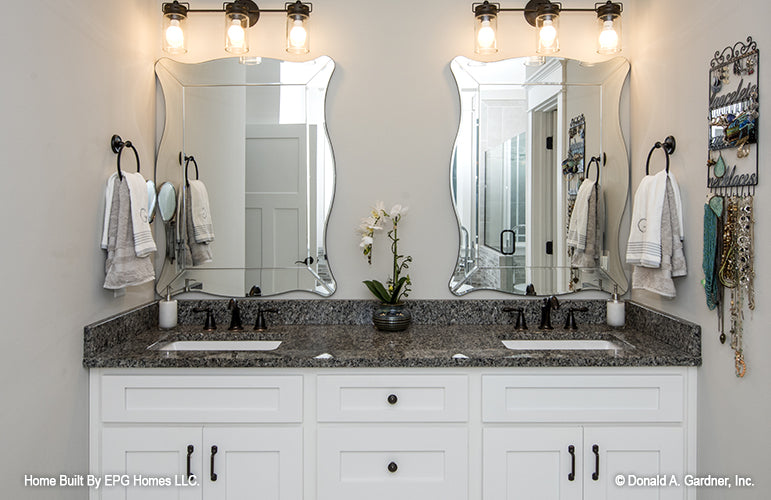 This is a picture of the double sink vanity in the master bathroom of simple house plan 1108 The Radford