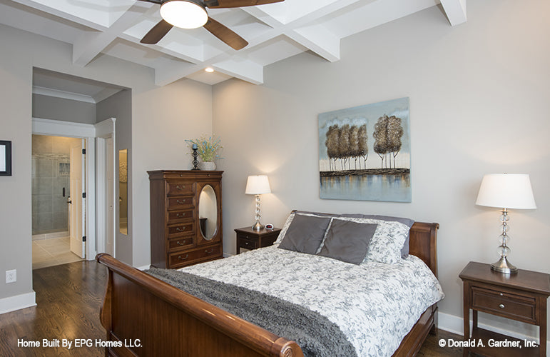 This picture shows master bedroom with coffered ceilings of simple house plan 1108 The Radford