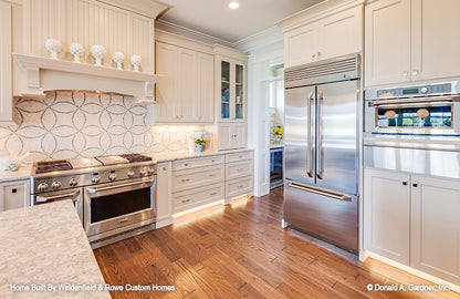 Stainless-steel appliances in the kitchen. The Rangemoss plan 1211.