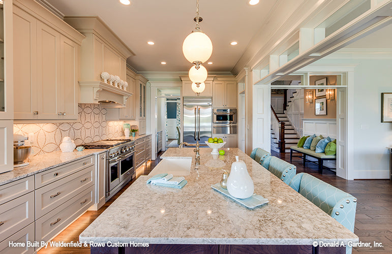 Recessed lighting in the kitchen. The Rangemoss plan 1211.