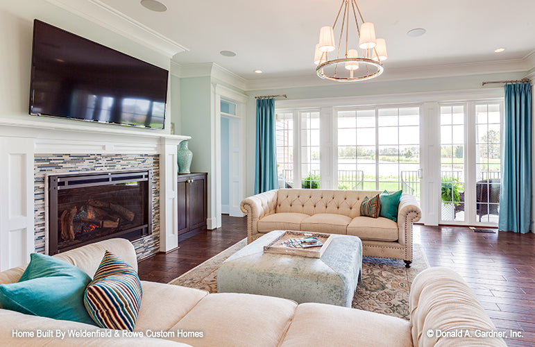 Glass patio door in the living room. The Rangemoss plan 1211.