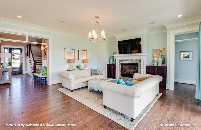 Full living room view with foyer off to the side. The Rangemoss plan 1211.