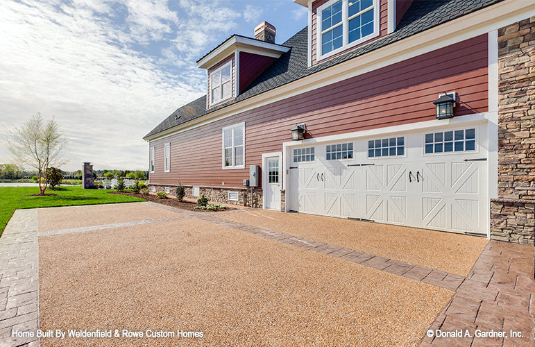 Barn style garage doors. The Rangemoss plan 1211.