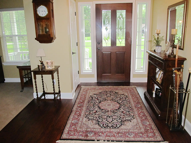 This is a photograph of the foyer of three bedroom house plan 915 The Remington as built by a customer