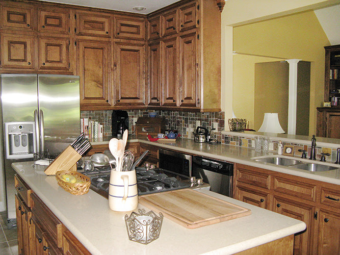 This is a photograph of the kitchen of three bedroom house plan 915 The Remington as built by a customer