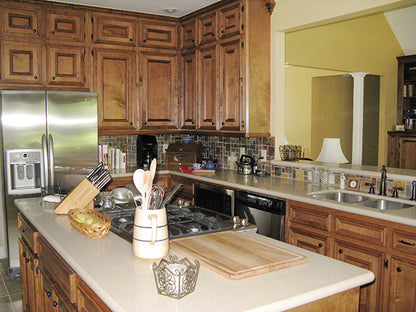 This is a photograph of the kitchen of three bedroom house plan 915 The Remington as built by a customer