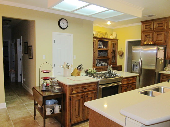 This is a photograph of the kitchen and hutch of three bedroom house plan 915 The Remington as built by a customer