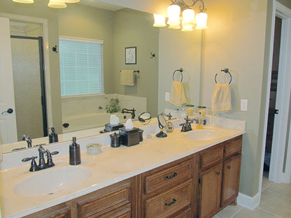 This is a photograph of the master bath of three bedroom house plan 915 The Remington as built by a customer