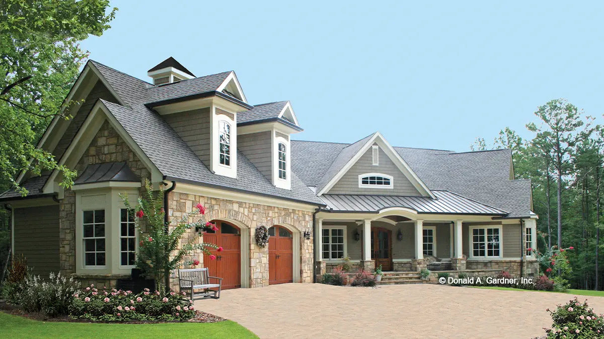 This is a photograph of the front of four bedroom house plan 1157 The Richelieu as built by a customer