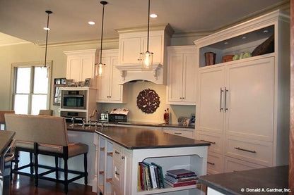 This is a kitchen picture with island for one story house plan 1157 The Richelieu