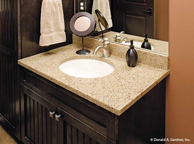 Single sink vanity in the powder room. The Riva Ridge plan 5013.