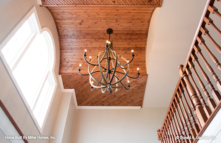 Picture of foyer with grand chandelier for Riverbend house plan 225