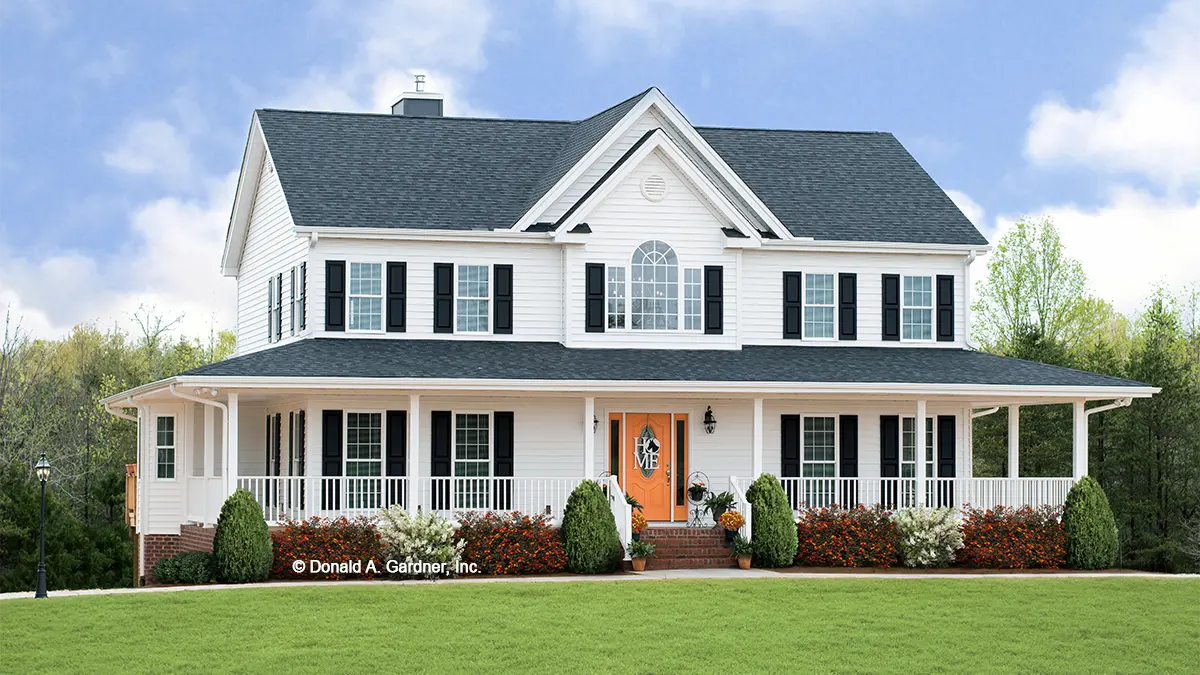 This is a photograph of the front of farmhouse house plan 225 The Riverbend as built by a customer