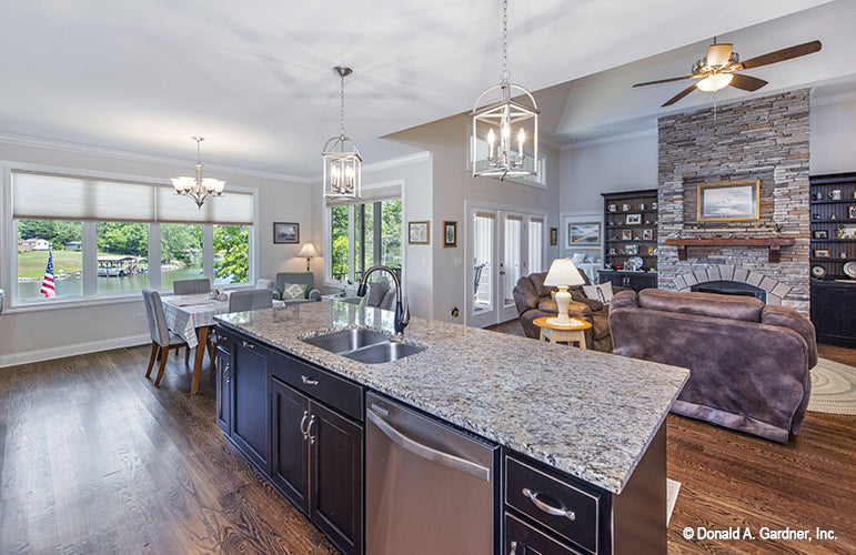 Picture of great room, kitchen and rear view of  Riverpointe house plan 1247 