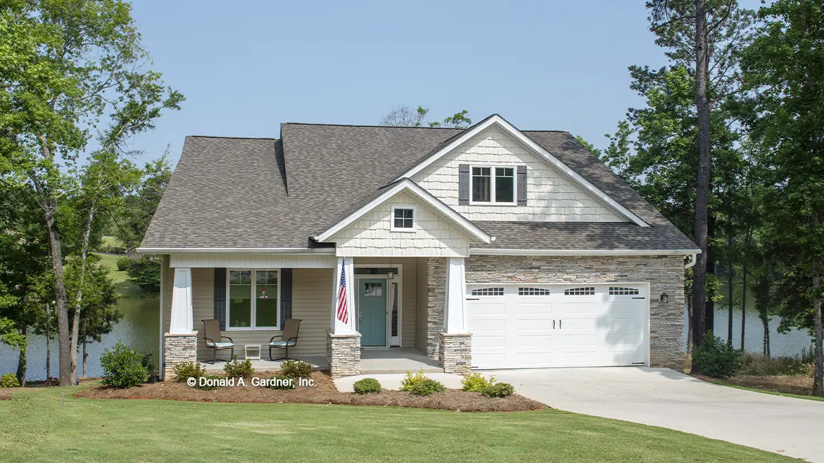 This is a photograph of the front of craftsman house plan 1247 The Riverpointe as built by a customer