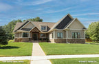 This is a photograph of the front of cottage house plan 1406 The Roark as built by a customer