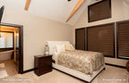 The master bedroom is a quiet retreat in cottage house plan 1406 The Roark