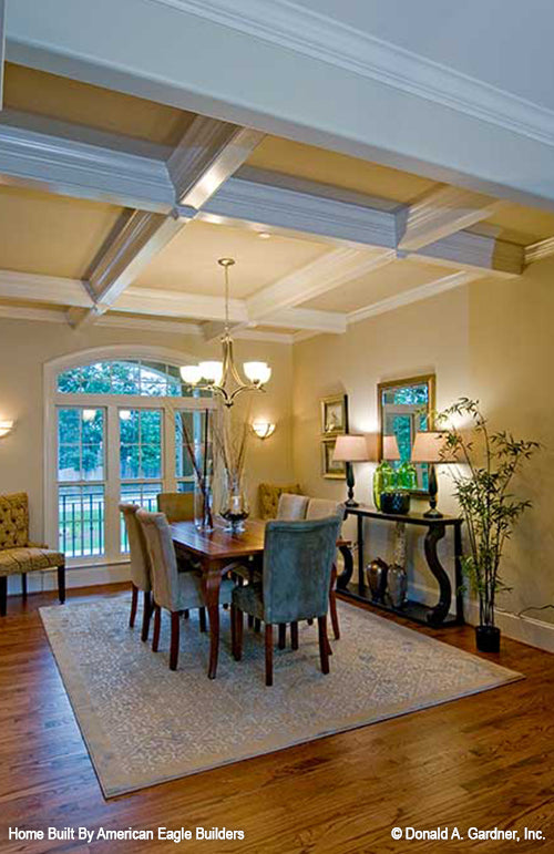 This is a dining room with coffered ceiling picture of five bedroom house plan 1204 The Rochelle