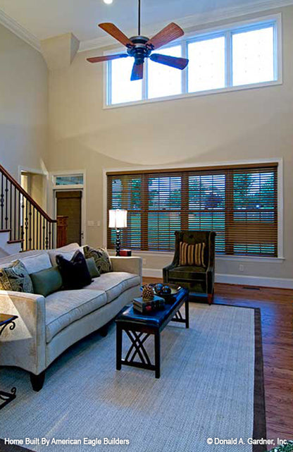 This is a great room with rear view picture of five bedroom house plan 1204 The Rochelle