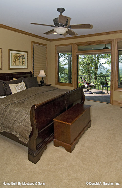 French patio doors in the master bedroom. The Rockledge plan 875.