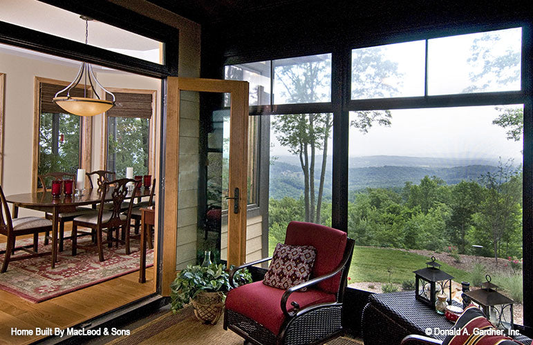 Screened in porch with view into the dining room. The Rockledge plan 875.