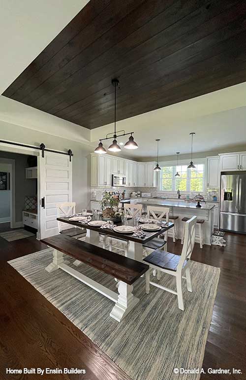 Sliding farm doors in the dining room. The Rogers plan 1383. 