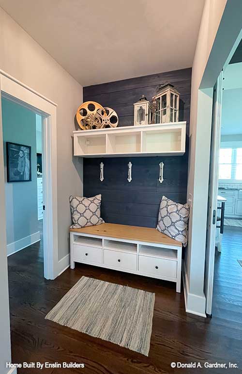 Storage bench and hooks in the hallway. The Rogers plan 1383. 