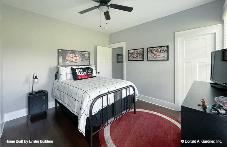 Cozy secondary bedroom with ceiling fan. The Rogers plan 1383. 