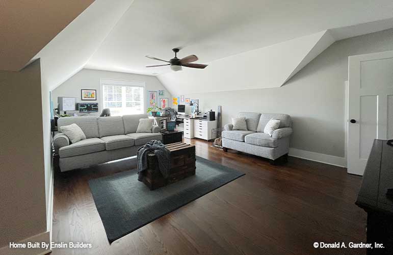 Clipped ceiling and ceiling fan in the bonus room. The Rogers plan 1383. 