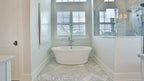 A garden tub provides peak relaxation in house plan 1378 The Roseburg