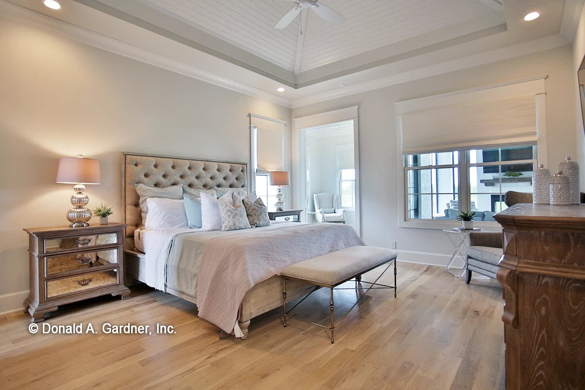 The master bedroom is a quiet retreat in luxury house plan 1378 The Roseburg