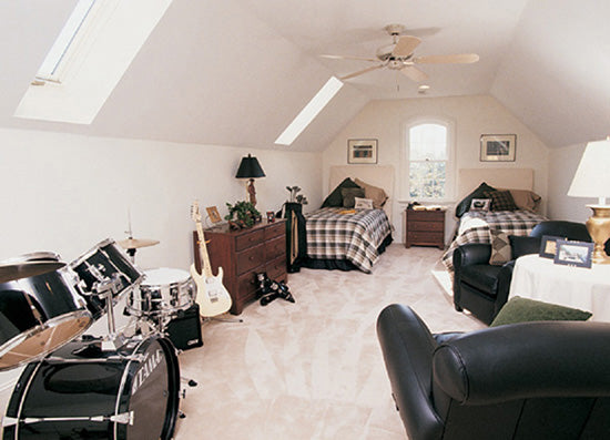 Bonus room converted into a bedroom with two beds. The Rousseau plan 451.