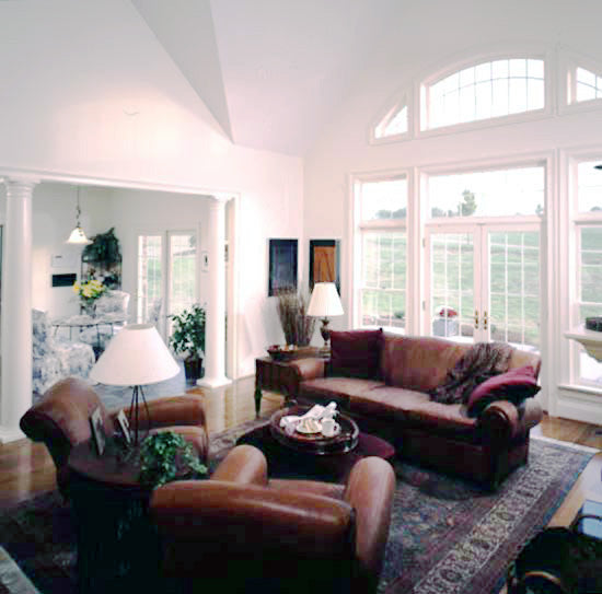 Large arched window in the great room. The Rousseau plan 451.