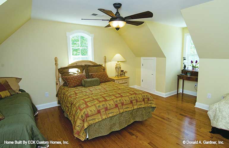 Clipped ceiling and attic access door in the bonus room. The Rowan plan 1366. 