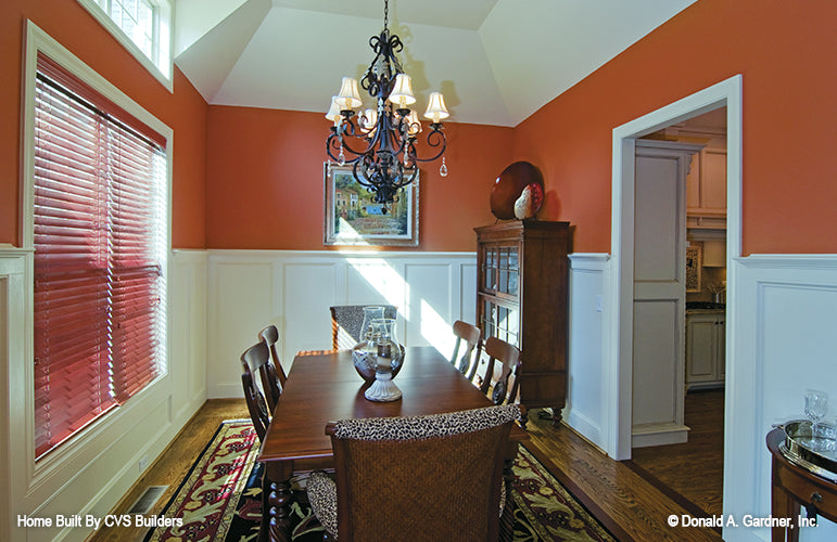 Chandelier over the table in the dining room. The Runnymeade plan 1164.