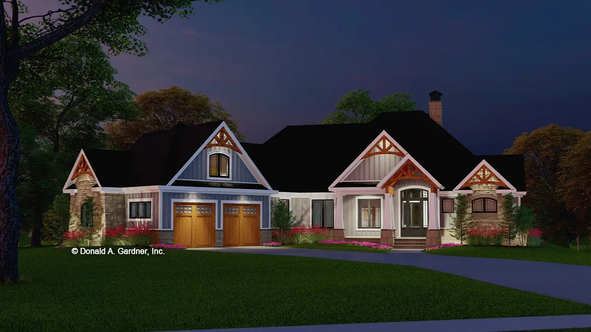 This is an illustration of the front of cottage house plan 1615 The Rupert at dusk