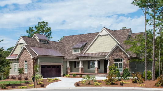 This is a photograph of the front of craftsman house plan 1226 The Sagescrest as built by a customer