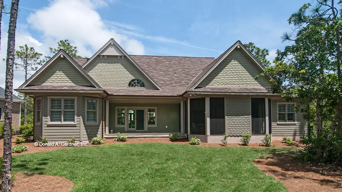 This is a photograph of the rear of ranch house plan 1226 The Sagescrest as built by a customer