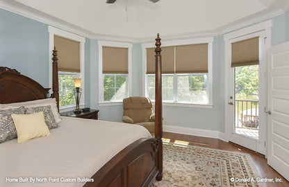 The master bedroom has a private sitting area in house plan 1329 The Sandy Creek